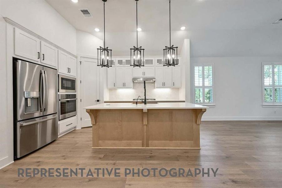 Furnished interior view inside a new home in Treeline, Justin (Image 6).
