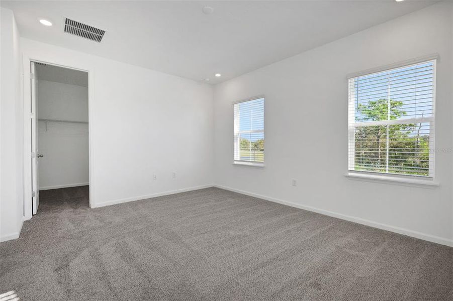 Spacious, unfurnished interior of a new home in Serenade at Ovation, Winter Garden (Image 24). Spacious, unfurnished interior of a new home in Serenade at Ovation, Winter Garden (Image 24).