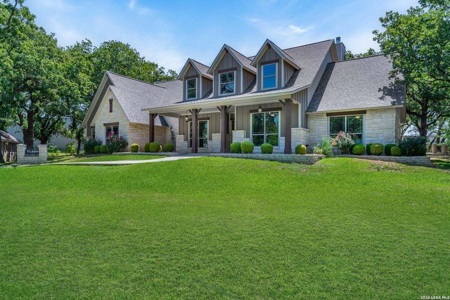 Front exterior of a new home in , Kerrville, TX, highlighting curb appeal (Image 7).