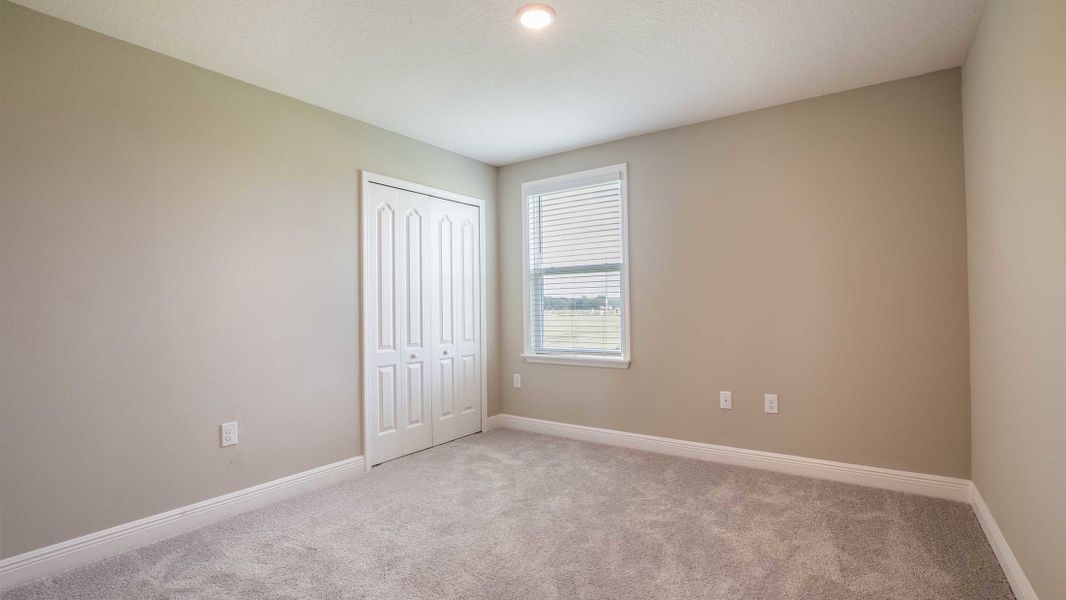 Representative unfurnished interior of a home built from the Columbus by Maronda Homes in Bella Estates, Plant City (Image 22).