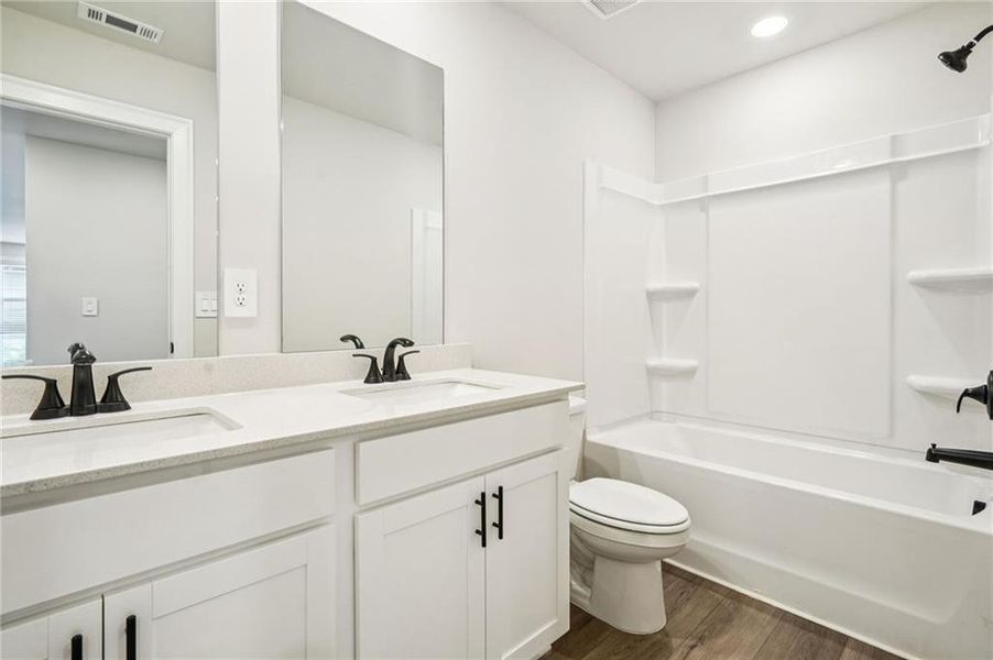 Furnished interior view inside a new home in Martin Springs - Estate Series, Lawrenceville (Image 14).