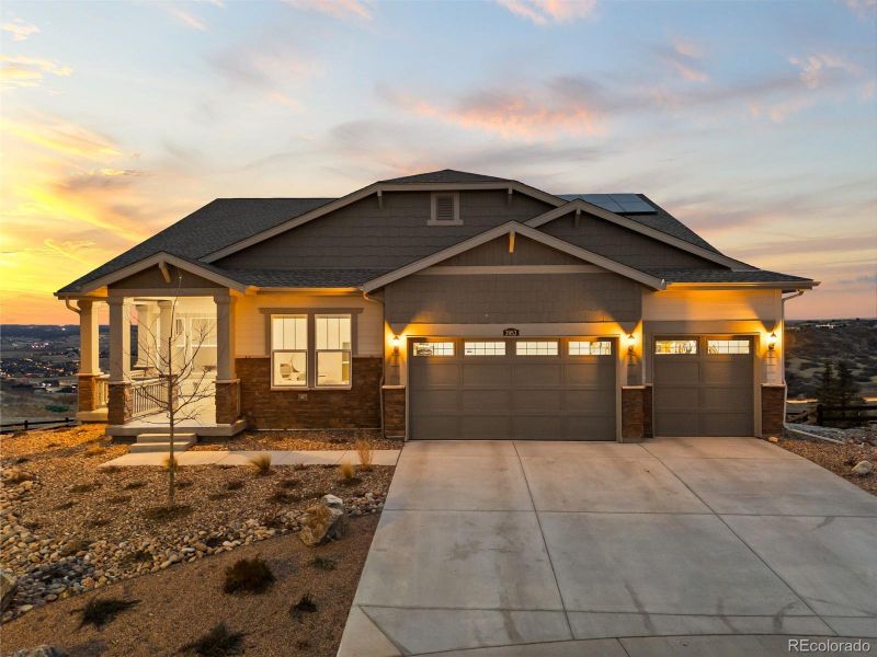 Front exterior of a new home in Macanta: The Legends Collection, Castle Rock, CO, highlighting curb appeal (Image 1). Front exterior of a new home in Macanta: The Legends Collection, Castle Rock, CO, highlighting curb appeal (Image 1).