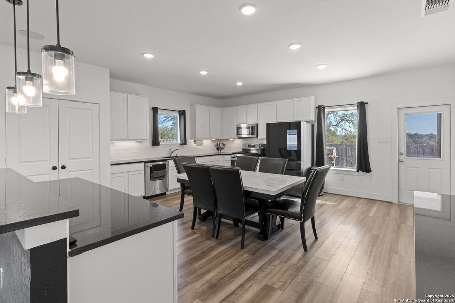 Furnished interior view inside a new home in Hickory Ridge, Elmendorf (Image 6).