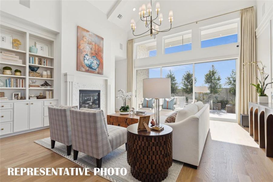 The full wall slider in this dream family room easily brings the outdoors in! REPRESENTATIVE PHOTO The full wall slider in this dream family room easily brings the outdoors in! REPRESENTATIVE PHOTO