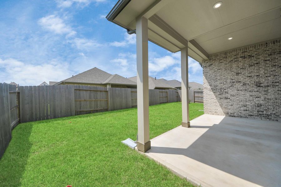 Front exterior of a new home in Amira: Heritage Collection, Tomball, TX, highlighting curb appeal (Image 18). Front exterior of a new home in Amira: Heritage Collection, Tomball, TX, highlighting curb appeal (Image 18).