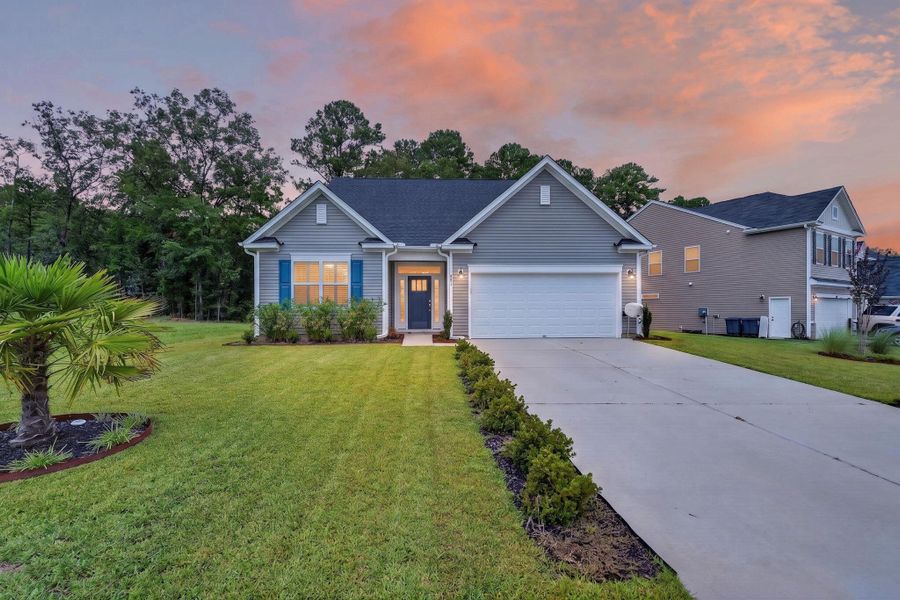 Front exterior of a new home in , Ridgeville, SC, highlighting curb appeal (Image 24).