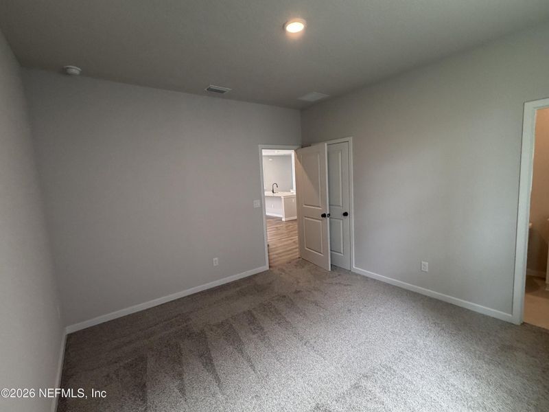 Spacious, unfurnished interior of a new home in Reserve East, Flagler Beach (Image 36).