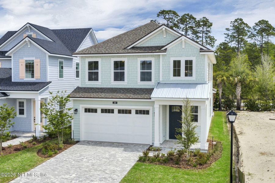 Front exterior of a new home in Seabrook Village at Seabrook, Nocatee, FL, highlighting curb appeal (Image 30).