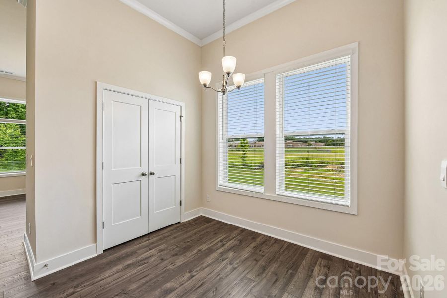 Spacious, unfurnished interior of a new home in Sanctuary at Southgate, Indian Trail (Image 14).