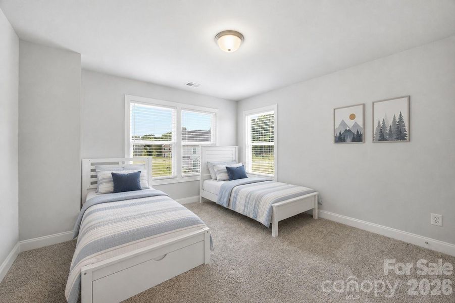 3rd Secondary upstairs bedroom **beds frames are actual, bedding is virtual**
