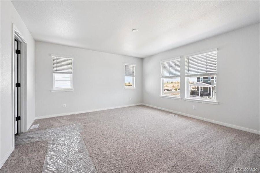 Spacious, unfurnished interior of a new home in The Boulevard II Collection at Windler, Aurora (Image 11). Spacious, unfurnished interior of a new home in The Boulevard II Collection at Windler, Aurora (Image 11).