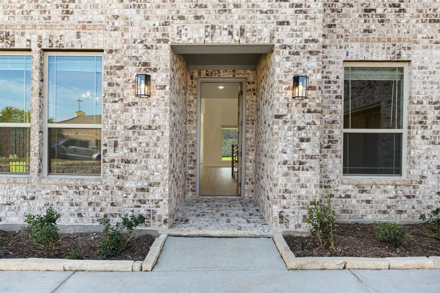 Exterior details and patio area of a home in The Enclave at Parks of Aledo, Aledo (Image 22). Exterior details and patio area of a home in The Enclave at Parks of Aledo, Aledo (Image 22).