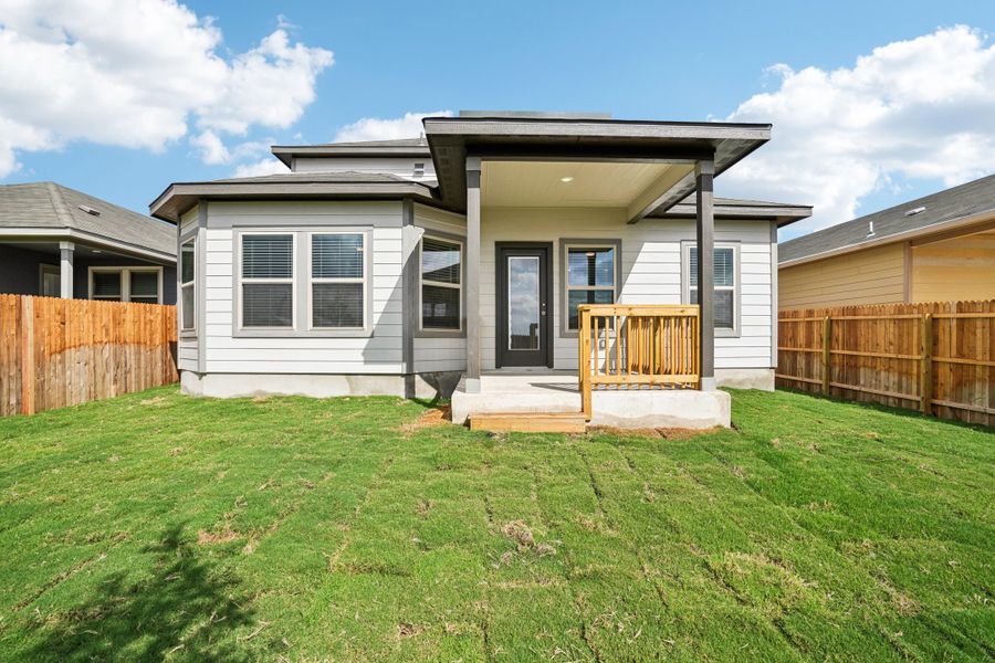 Back exterior of the Reynolds floorplan at a Meritage Homes community.