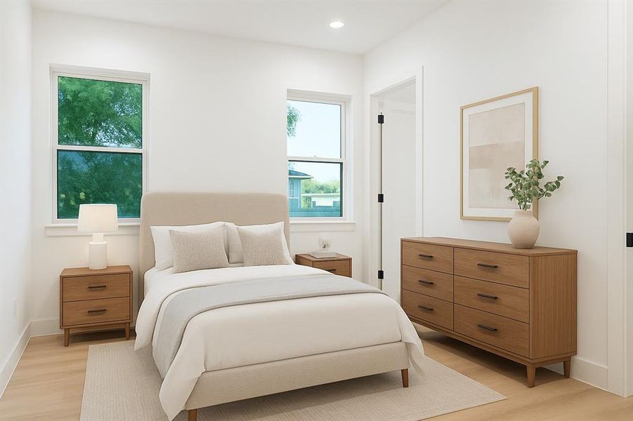 Bedroom with light wood-style flooring and recessed lighting