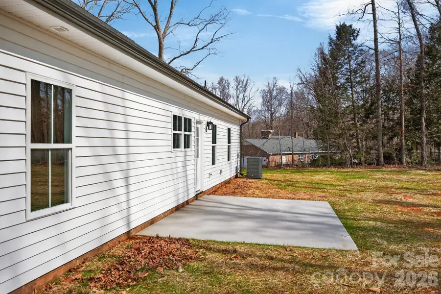 Exterior details and patio area of a home in , Rockwell (Image 28).