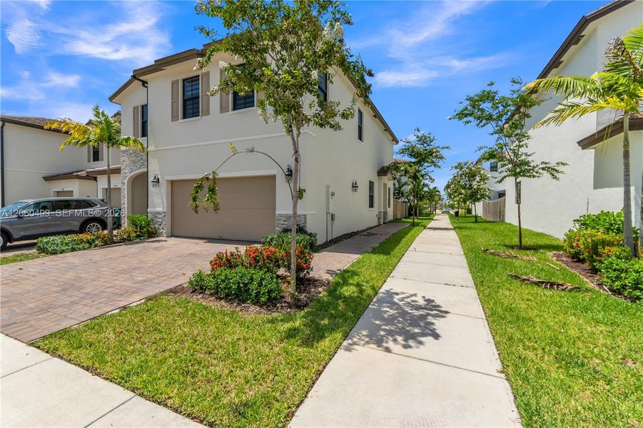 Front exterior of a new home in , Miami, FL, highlighting curb appeal (Image 22).