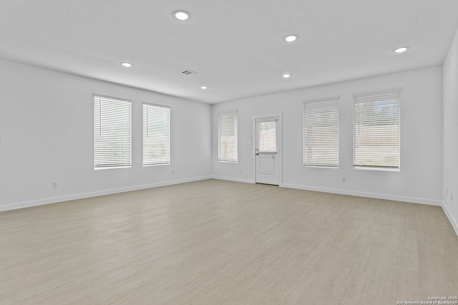 Spacious, unfurnished interior of a new home in Waterwheel: Coastline Collection, San Antonio (Image 24).