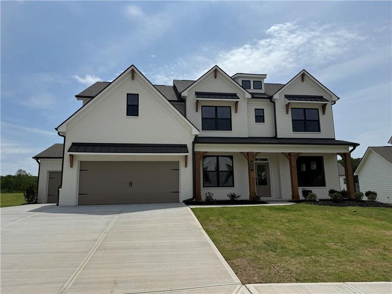 Front exterior of a new home in Rosewood Lake Estates, Hoschton, GA, highlighting curb appeal (Image 22).