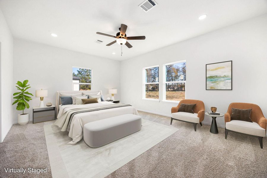 Spacious primary bedroom filled with natural light, featuring plush carpeting, elegant accents, and serene views—your perfect retreat. Spacious primary bedroom filled with natural light, featuring plush carpeting, elegant accents, and serene views—your perfect retreat.