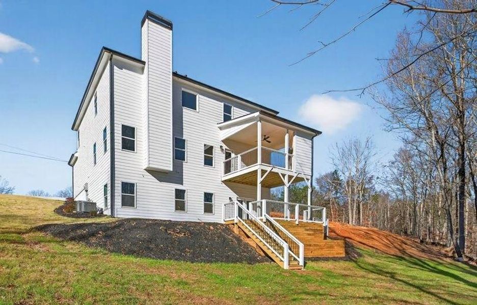 Exterior details and patio area of a home in , Flowery Branch (Image 27).