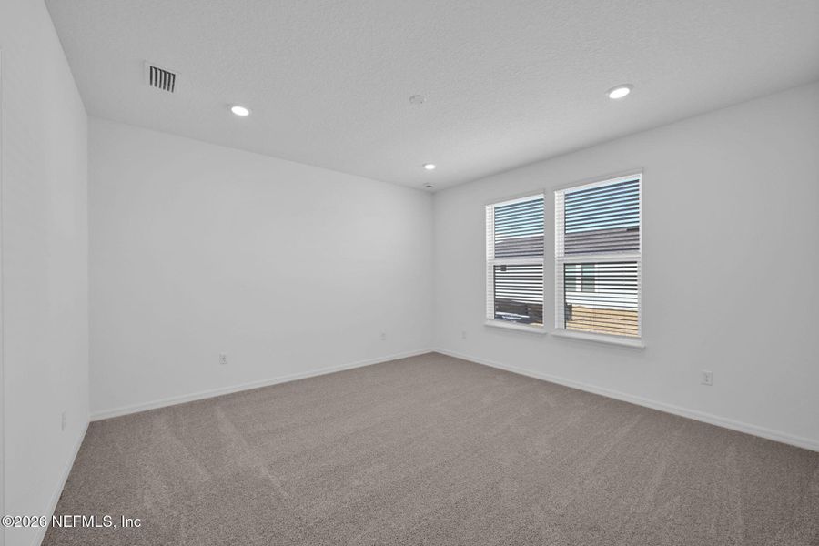 Spacious, unfurnished interior of a new home in Del Webb Wildlight, Yulee (Image 9).