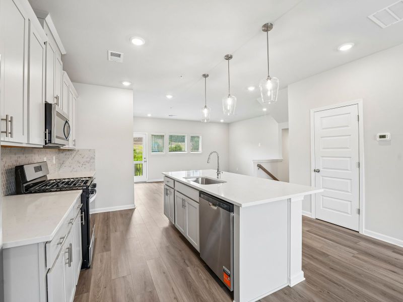 Furnished interior view inside a new home in Hemingway - Highland Series, Cumming (Image 9).