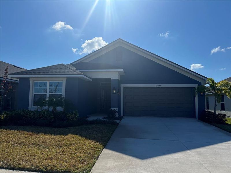 Front exterior of a new home in Abbey Glen, Dade City, FL, highlighting curb appeal (Image 15).