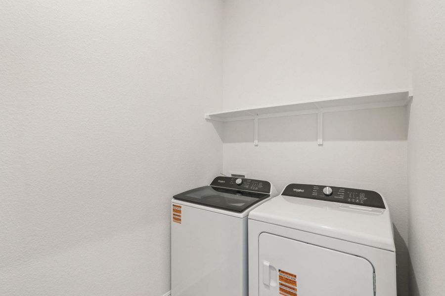 Laundry area featuring washing machine and clothes dryer Laundry area featuring washing machine and clothes dryer