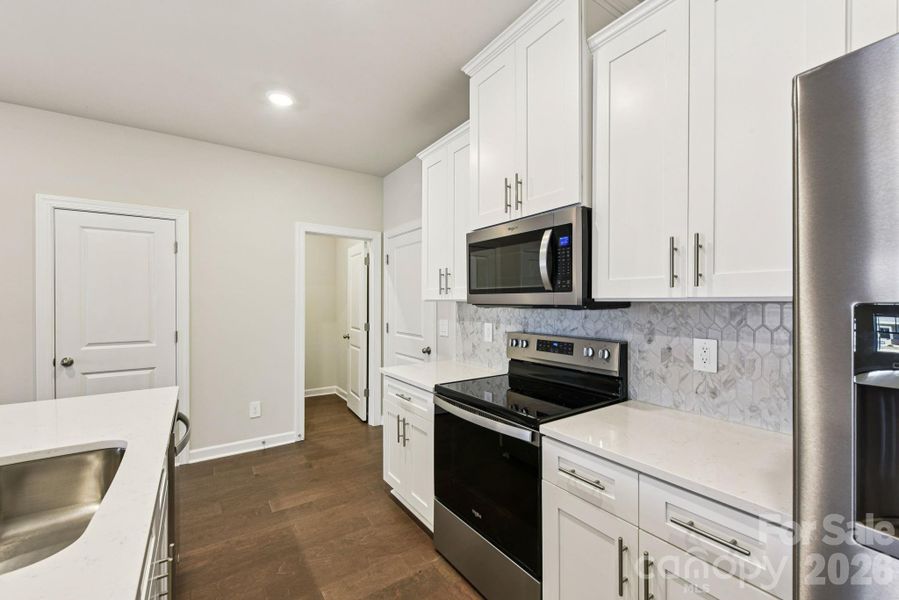 Photo is not of the actual home, but is an inspirational photo of builder’s model home and may depict options, furnishings, and/or decorator features that are not included