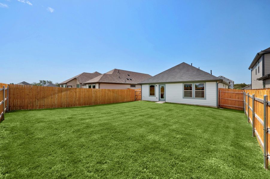 Exterior details and patio area of a home in Trinity Ranch, Elgin (Image 21).