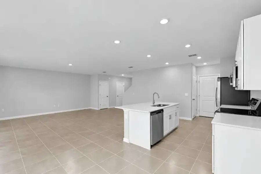 Representative unfurnished interior of a home built from the Dove by Taylor Morrison in Azure at Solaeris, Port St. Lucie (Image 18).