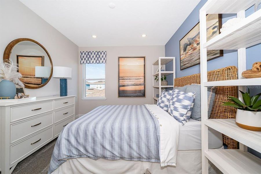 Furnished interior view inside a new home in Serenade at Ovation, Winter Garden (Image 18).
