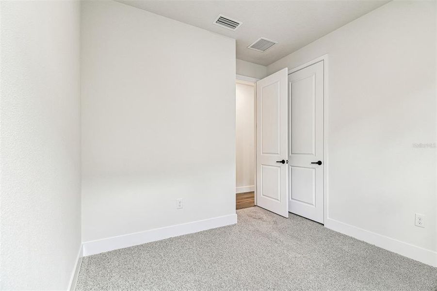 Spacious, unfurnished interior of a new home in The Peninsula at Rhodine Lake, Riverview (Image 36).