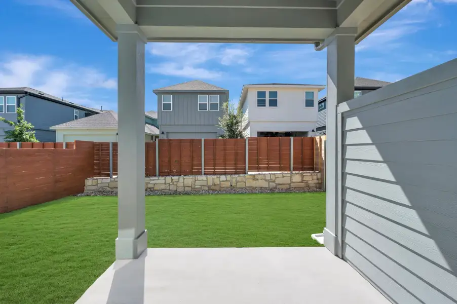 Exterior details and patio area of a home in The Twilight at Goodnight Ranch, Austin (Image 3).