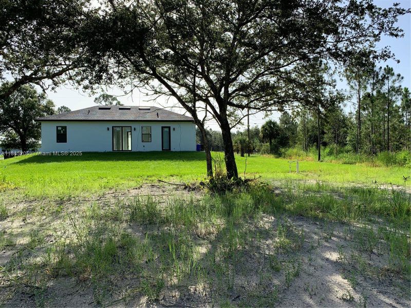 Exterior details and patio area of a home in , Lehigh Acres (Image 3). Exterior details and patio area of a home in , Lehigh Acres (Image 3).
