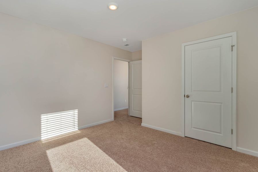 Representative unfurnished interior of a home built from the HAYDEN by D.R. Horton in Island Green, Myrtle Beach (Image 24).