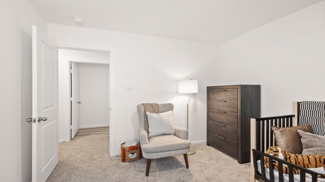 Representative furnished interior of a home built from the 1293 by D.R. Horton in Bridges on Lake Houston Villas, Humble (Image 14).