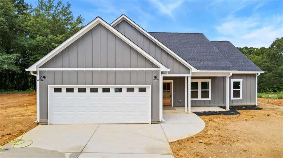 Front exterior of a new home in , Cedartown, GA, highlighting curb appeal (Image 1).
