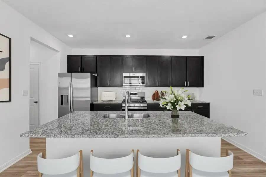 Furnished interior view inside a new home in Sunfield, Buda (Image 9).
