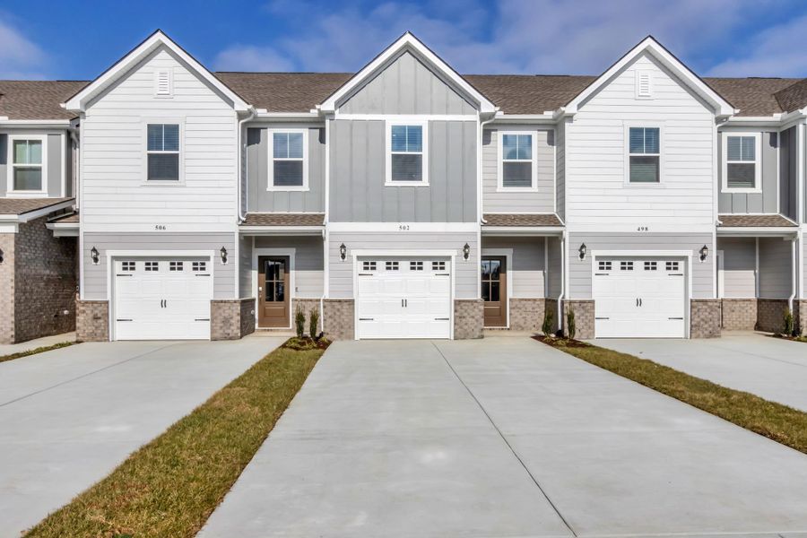 Front exterior of a new home in Cedar Grove Village, Smyrna, TN, highlighting curb appeal (Image 1). Front exterior of a new home in Cedar Grove Village, Smyrna, TN, highlighting curb appeal (Image 1).