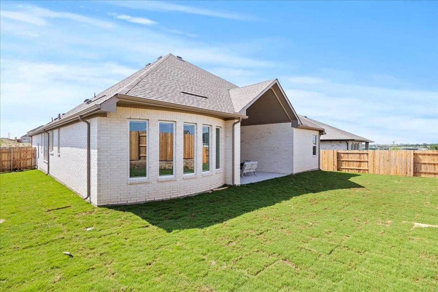 Exterior details and patio area of a home in Broken Oak, Georgetown (Image 27).