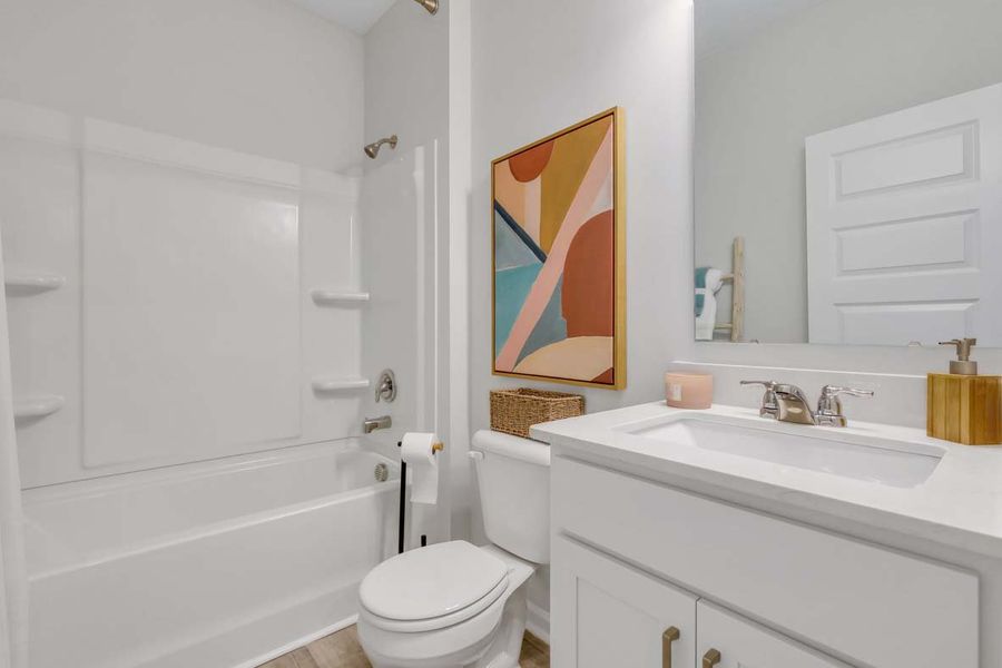 Representative furnished interior of a home built from the TUSCAN by D.R. Horton in Westbrook Retreat Villas at Savannah Quarters, Pooler (Image 26).