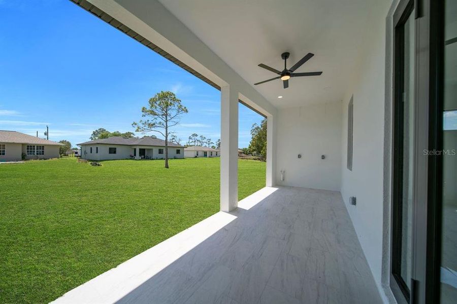 Exterior details and patio area of a home in , Lehigh Acres (Image 3).