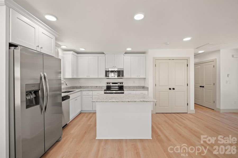 Furnished interior view inside a new home in , Newton (Image 3).