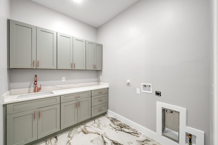 Well-designed laundry room with ample space for storage and organization