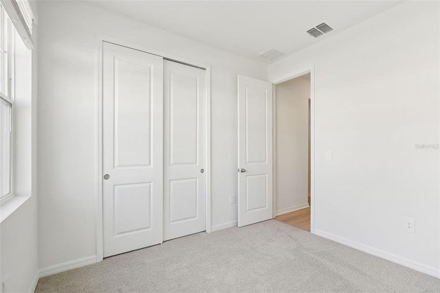 Spacious, unfurnished interior of a new home in Coasterra - Reserve Series, Palmetto (Image 37).