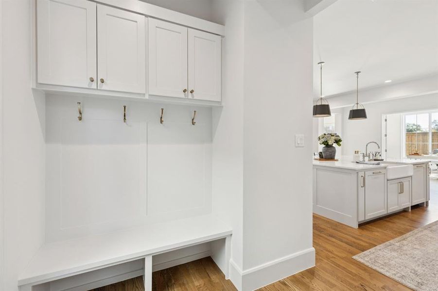 Mudroom featuring light wood-style floors and recessed lighting Mudroom featuring light wood-style floors and recessed lighting