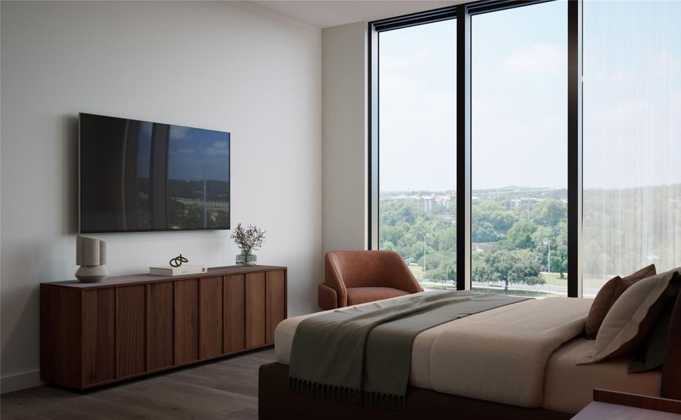 Bedroom featuring recessed lighting, wood flooring, and a large picture window. Designed with warm, neutral tones and clean architectural lines that create a calm and restful environment. Bedroom featuring recessed lighting, wood flooring, and a large picture window. Designed with warm, neutral tones and clean architectural lines that create a calm and restful environment.
