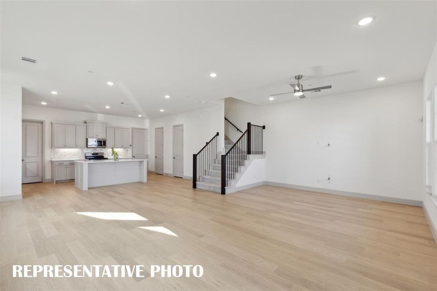 Our Wyatt floor plan offers an open concept design that is perfect for entertaining a crowd or enjoying cozy family get togethers!  REPRESENTATIVE PHOTO