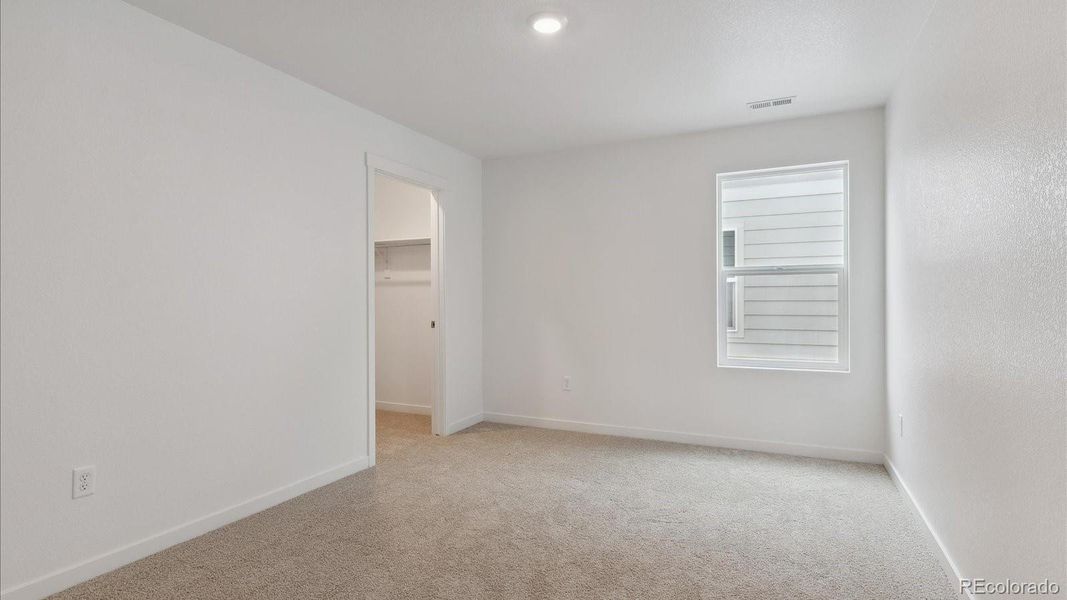 Spacious, unfurnished interior of a new home in Silver Peaks, Lochbuie (Image 18).